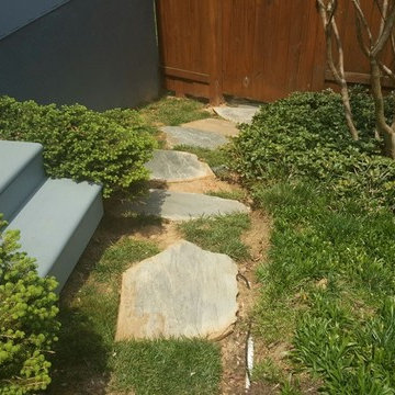 Exterior stairs with underground drainage system.