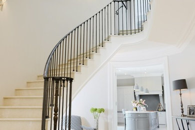 This is an example of a traditional staircase in Other with feature lighting.