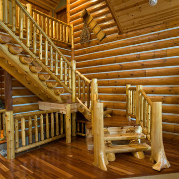 Flared cedar posts and half log staircase