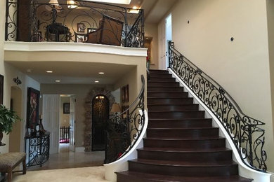 This is an example of a wood staircase in Orange County with wood risers.