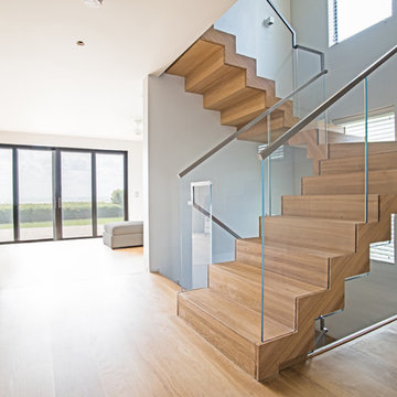 Floating Staircase: White Oak Wood & StarFire Glass Railings