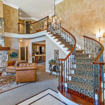 Formal Living Room with Curved Stair Case