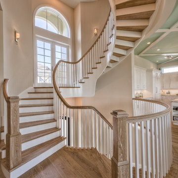 Four Story Curved Stair & Wood Floors