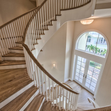 Four Story Curved Stair & Wood Floors