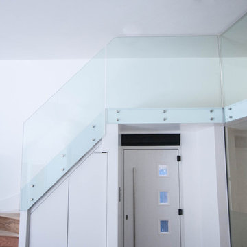 Frameless Glass Balustrade to the existing staircase and mezzanine floor