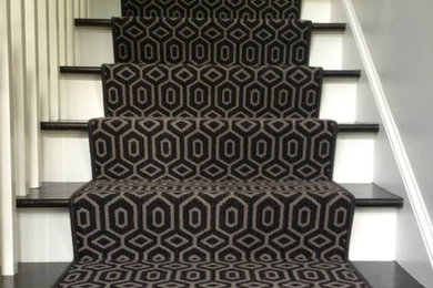 Staircase - carpeted straight staircase idea in Charlotte