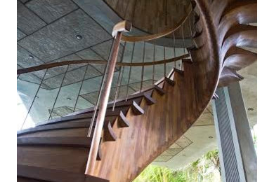 Staircase - contemporary wooden staircase idea in Hawaii