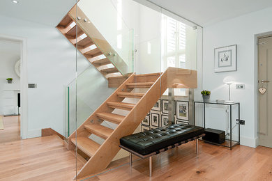 Photo of a contemporary staircase in London with feature lighting.