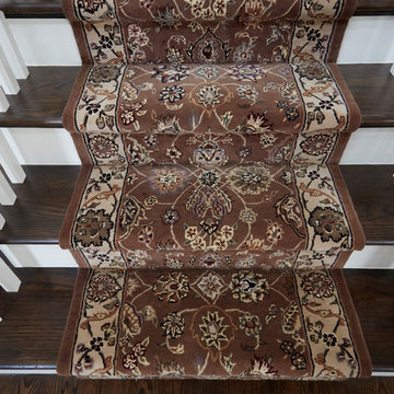 Glenview Renovations - Carpet Runner Over Beautiful Wood