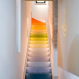 Inspiration for a medium sized eclectic staircase in London.