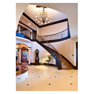 https://st.hzcdn.com/fimgs/pictures/staircases/grand-curved-staircase-priester-s-custom-contracting-llc-img~245109350f0480d2_2549-1-3d982b2-w320-h320-b1-p10.jpg