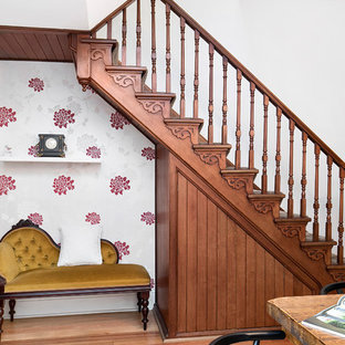 This is an example of a victorian wood straight staircase in Sydney with wood railing and wood risers.