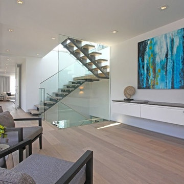Grandview Drive Hollywood Hills modern home hallway and floating stairs