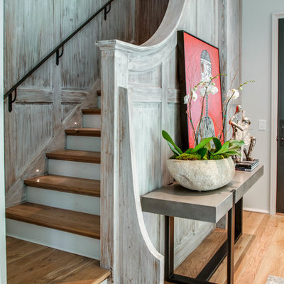 Staircase - eclectic wooden wood railing staircase idea in Nashville with painted risers