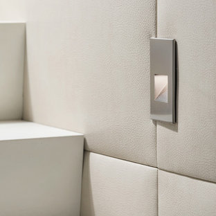 Ispirazione per una grande scala a "U" design con pedata in pietra calcarea, alzata in pietra calcarea e parapetto in materiali misti