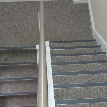 Grey Carpet to Stairs With Black Nosings