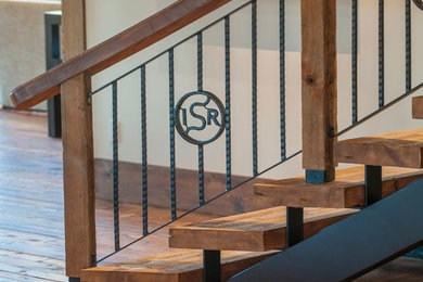 Example of a mid-sized country wooden straight open staircase design in Bridgeport