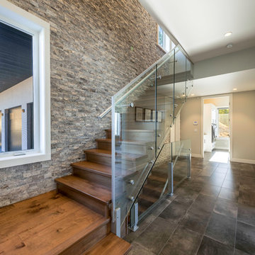 Hardwood Stairs With Stone Accent Wall