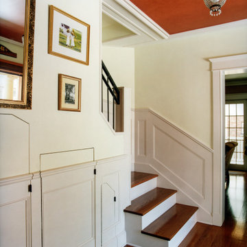 Hidden doors make use of the space under the stairs
