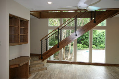 Foto de escalera suspendida actual grande sin contrahuella con escalones de madera