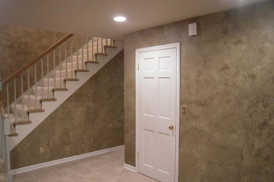 Mid-sized elegant carpeted l-shaped staircase photo in Milwaukee