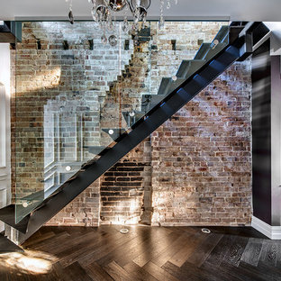 Inspiration for an industrial metal straight staircase remodel in Sydney