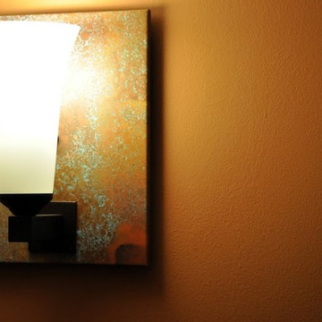 Hubbardton Forge Copper Sconce In stairway