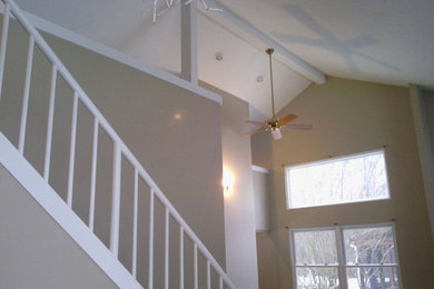 Staircase - large traditional straight staircase idea in Cleveland