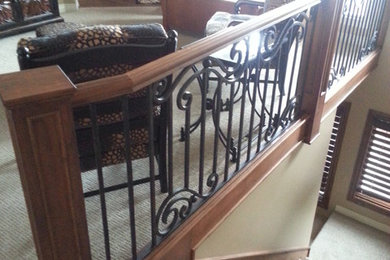 Example of a mid-sized classic carpeted l-shaped staircase design in Wichita with carpeted risers