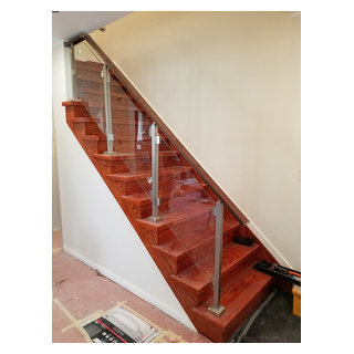 Interior square staircase railing system with tempered glass inserts ...