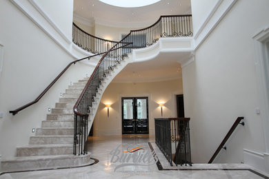 This is an example of a classic curved staircase in Surrey.