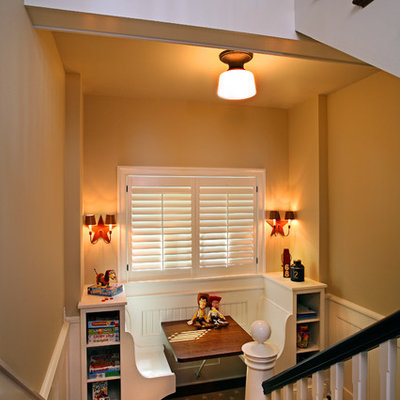 Large trendy u-shaped staircase photo in Grand Rapids