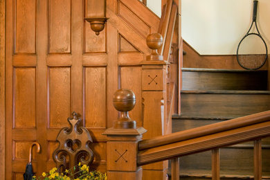 Inspiration for a timeless wooden l-shaped staircase remodel in Oklahoma City with wooden risers