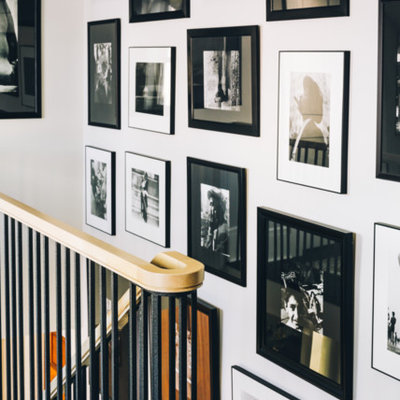 Inspiration for a mid-sized cottage wooden straight metal railing staircase remodel in Portland Maine with painted risers