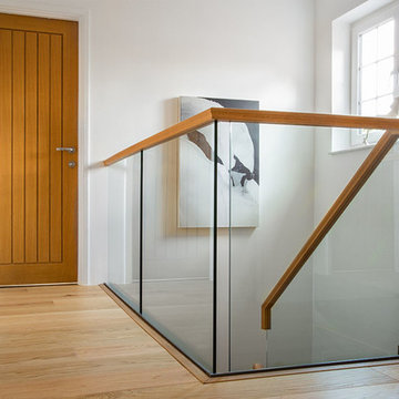 Kinnaird Avenue - Self Supporting Spine Staircase, Oak and Glass