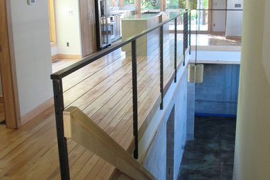 Inspiration for a modern wooden floating open staircase remodel in Indianapolis