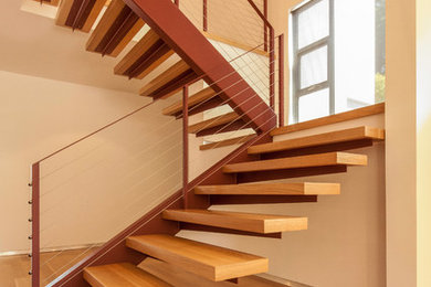 Inspiration for a modern floating open staircase remodel in Los Angeles