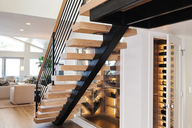 Example of a mountain style staircase design in Grand Rapids