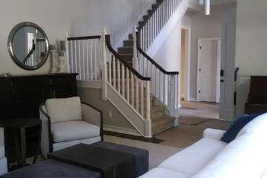 Staircase - large craftsman l-shaped wood railing staircase idea in Portland