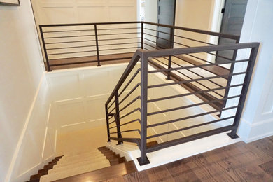 Mid-sized trendy metal l-shaped metal railing staircase photo in Columbus with metal risers