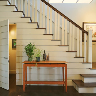 Inspiration for a timeless wooden l-shaped staircase remodel in Other