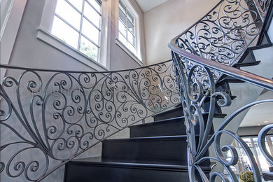 Inspiration for an eclectic curved staircase remodel in Denver