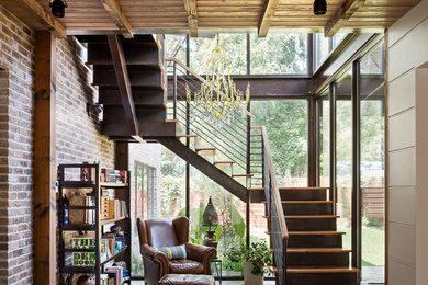 Staircase - rustic wooden staircase idea in Austin with metal risers