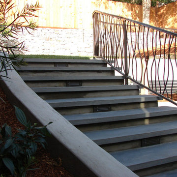 Lighted Stone Stairs and Custom Iron Handrail