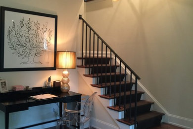 Inspiration for a country wooden staircase remodel in Other with painted risers