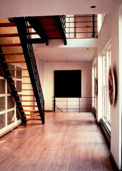 Contemporary Staircase by Carlos E.Ostrej Design LLC