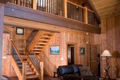 Example of a large mountain style wooden l-shaped staircase design in Other with wooden risers
