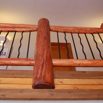 Log staircase railings (reclaimed lodgepole pine beatle kill wood)