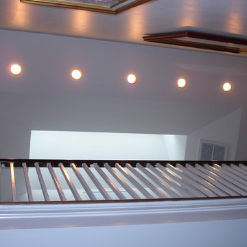 Looking up stairwell to skylight