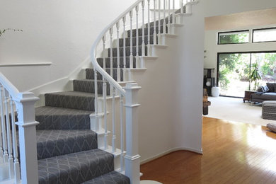 Staircase - mid-sized traditional carpeted l-shaped staircase idea in Los Angeles with carpeted risers